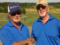 Jerry Orman receiving congratulations from Bill Murray on his Notre Dame Hole-in-One.